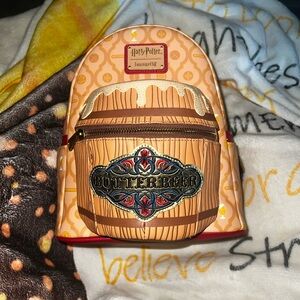 Warner Bros. Butterbeer Themed Backpack with Red and Yellow Accents